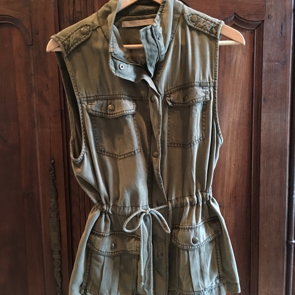 Long, drawstring waisted vest.
